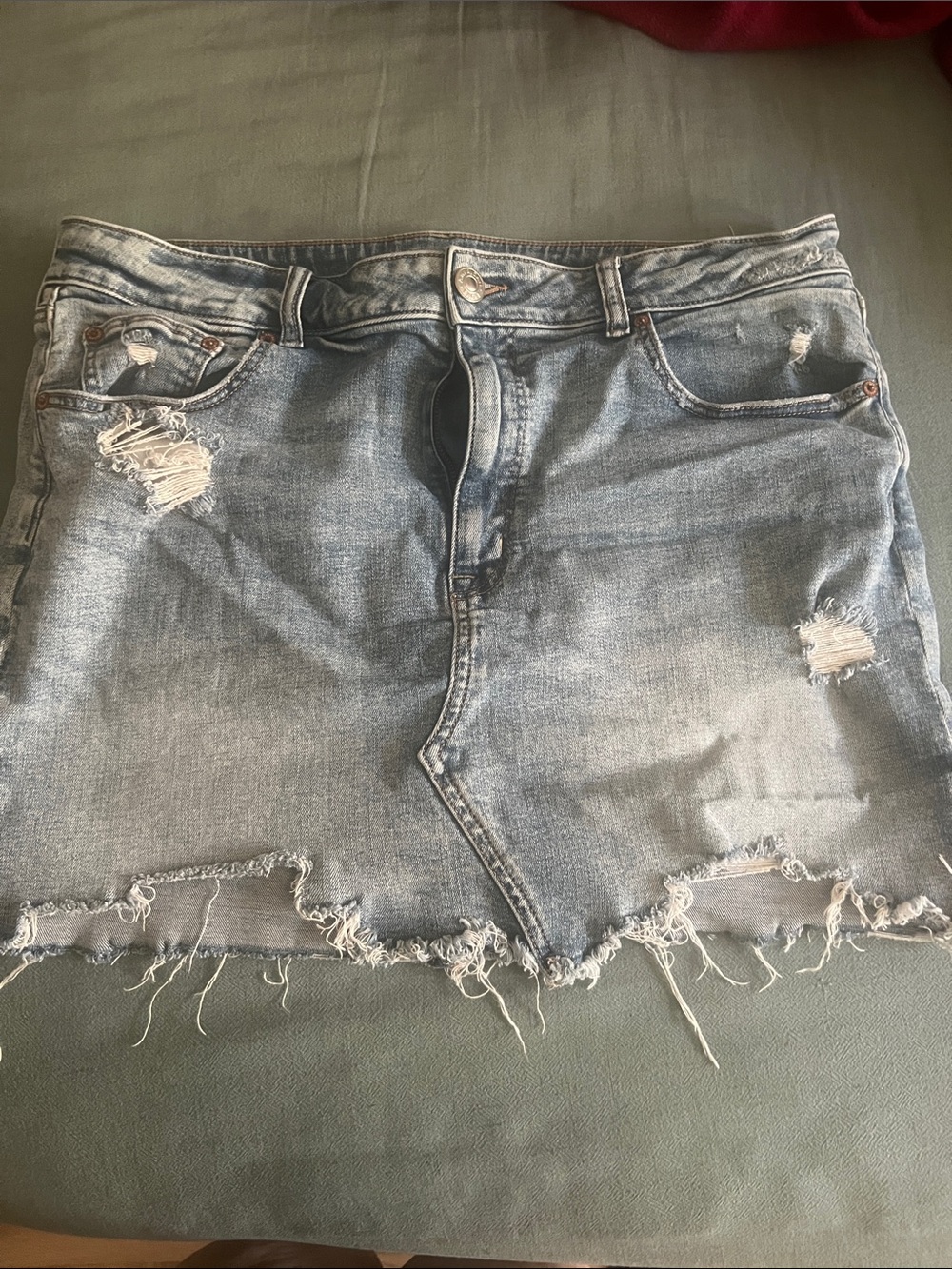 American Eagle Outfitters Light Blue Distressed Denim Mini Skirt with Frayed Hem